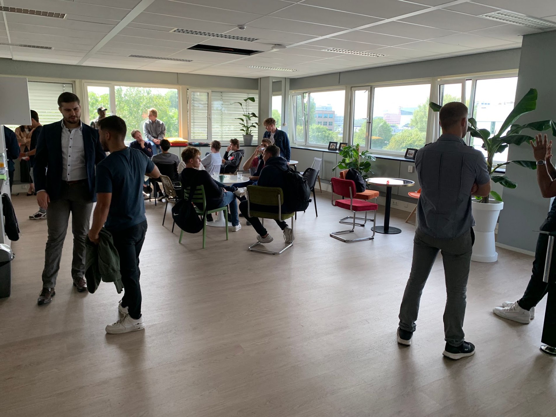 Students collaborating in the Team Academy Amsterdam startup environment