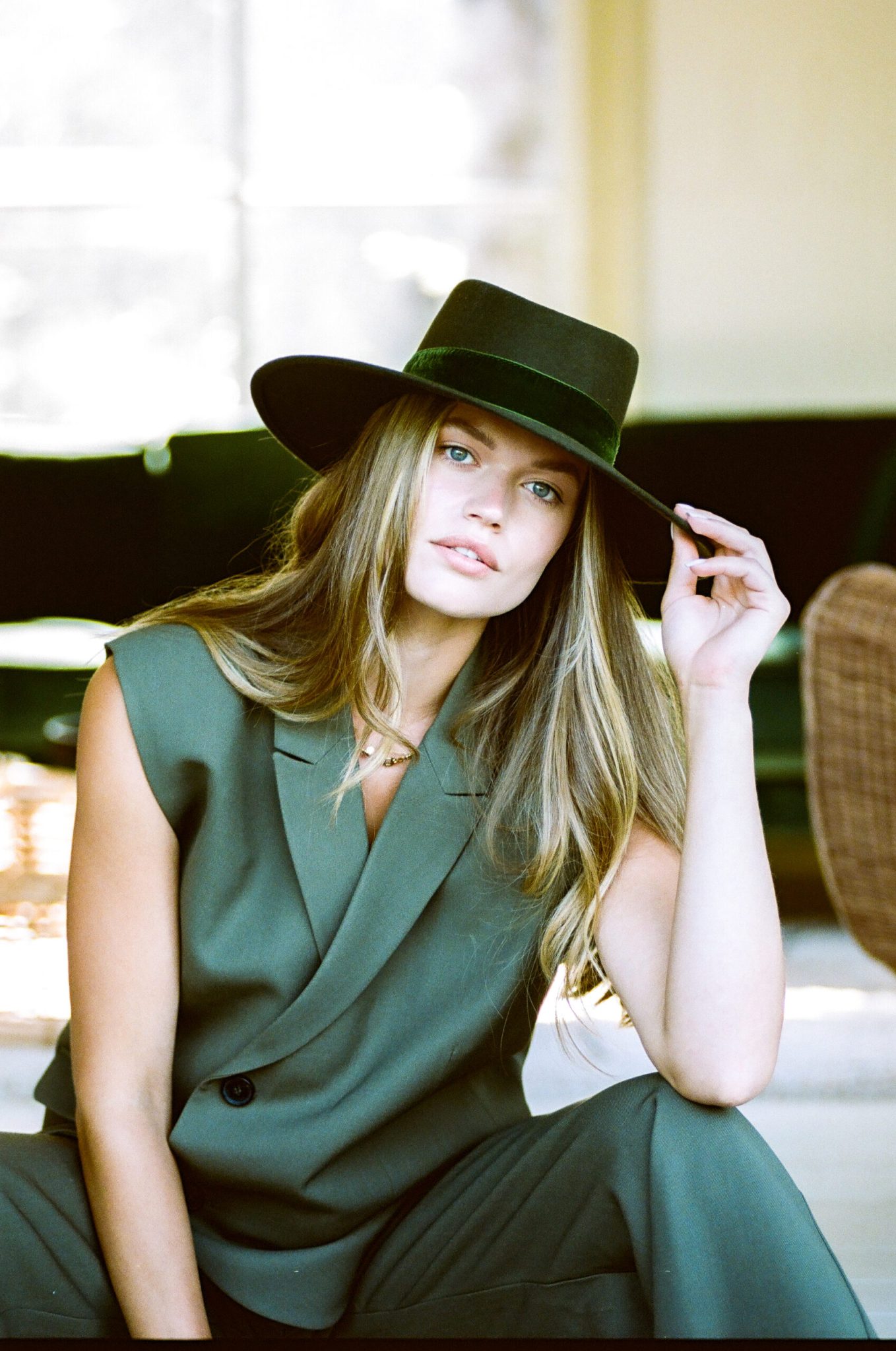 Model wearing a green wool Hoed Amsterdam fedora